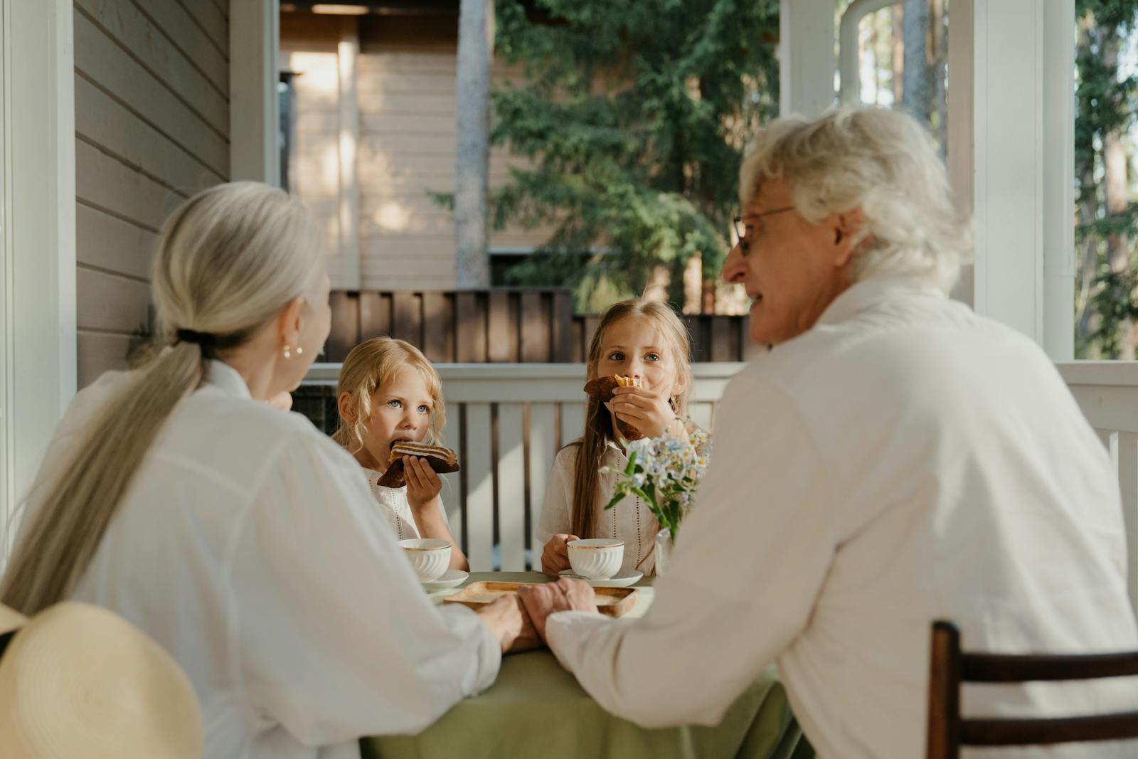 Grandparents with their grandchildren at home